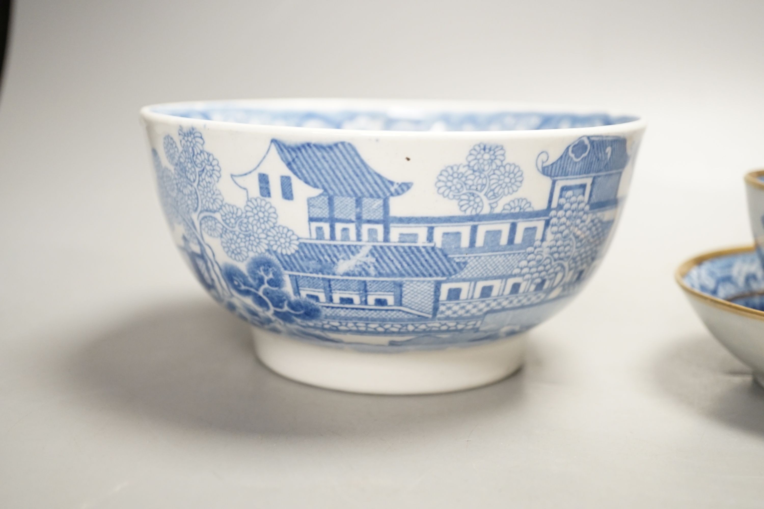 A New Hall slops bowl printed with the 'Duck' pattern and a teabowl and saucer printed with the 'Moth' pattern c.1790, Slops bowl 15.5 cms diameter.